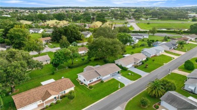 Well Maintained *Pecan* Model in Spruce Creek South - 55+ Gated on The Links of Spruce Creek in Florida - for sale on GolfHomes.com, golf home, golf lot
