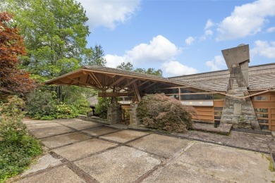 Situated on a quiet cul-de-sac near the front of Wildcat Cliffs on Wildcat Cliffs Country Club in North Carolina - for sale on GolfHomes.com, golf home, golf lot