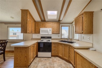 Corner Lot Gem with Covered Parking in Riverview Resort s 55+ on Riverview Golf Course in Arizona - for sale on GolfHomes.com, golf home, golf lot