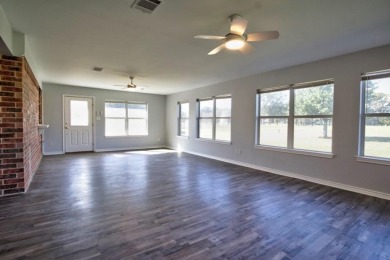 This beautiful 3-bedroom, 3-bathroom brick home in the heart of on Cedar Creek Country Club in Texas - for sale on GolfHomes.com, golf home, golf lot