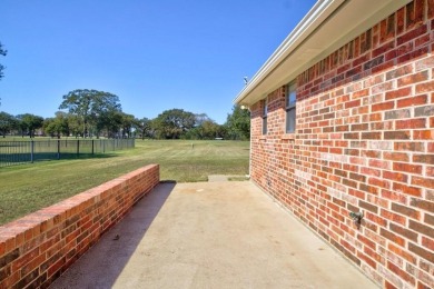 This beautiful 3-bedroom, 3-bathroom brick home in the heart of on Cedar Creek Country Club in Texas - for sale on GolfHomes.com, golf home, golf lot