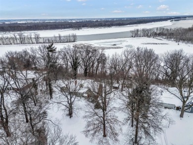 Charming Bluffside Retreat with Panoramic River Valley Views

 on Emerald Greens Golf Course in Missouri - for sale on GolfHomes.com, golf home, golf lot