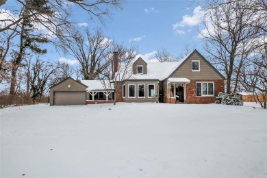 Charming Bluffside Retreat with Panoramic River Valley Views

 on Emerald Greens Golf Course in Missouri - for sale on GolfHomes.com, golf home, golf lot