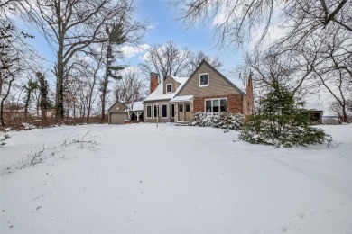 Charming Bluffside Retreat with Panoramic River Valley Views

 on Emerald Greens Golf Course in Missouri - for sale on GolfHomes.com, golf home, golf lot