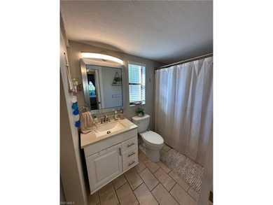 Ideally located just steps from the community pool, this MOVE-IN on Hibiscus Golf Club in Florida - for sale on GolfHomes.com, golf home, golf lot