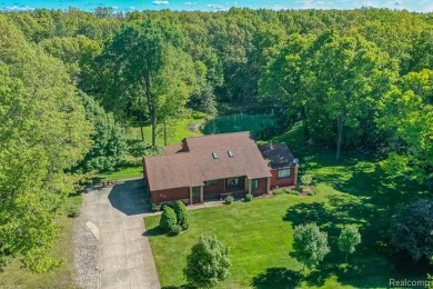 Immaculate one-owner home on 2.75 Acres with a delightful on Shepherds Hollow Golf Club in Michigan - for sale on GolfHomes.com, golf home, golf lot