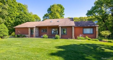 Immaculate one-owner home on 2.75 Acres with a delightful on Shepherds Hollow Golf Club in Michigan - for sale on GolfHomes.com, golf home, golf lot