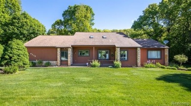 Immaculate one-owner home on 2.75 Acres with a delightful on Shepherds Hollow Golf Club in Michigan - for sale on GolfHomes.com, golf home, golf lot