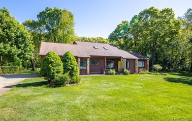 Immaculate one-owner home on 2.75 Acres with a delightful on Shepherds Hollow Golf Club in Michigan - for sale on GolfHomes.com, golf home, golf lot