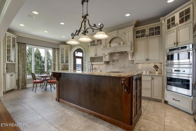 Spacious Tudor-Style Lakefront Home in Gated Golf Community

 on Wind River Golf Course in Tennessee - for sale on GolfHomes.com, golf home, golf lot