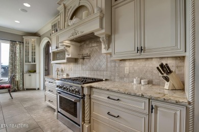 Spacious Tudor-Style Lakefront Home in Gated Golf Community

 on Wind River Golf Course in Tennessee - for sale on GolfHomes.com, golf home, golf lot