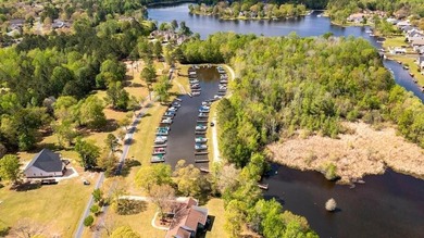 Golf Course Lot and Boat Slip. Buy now build later. Gated on Players Course At Wyboo Plantation in South Carolina - for sale on GolfHomes.com, golf home, golf lot