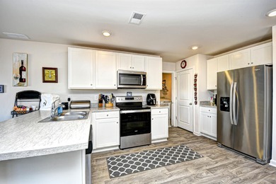 Welcome to 903 Freestyle Ct., where smart design meets everyday on Long Bay Club in South Carolina - for sale on GolfHomes.com, golf home, golf lot