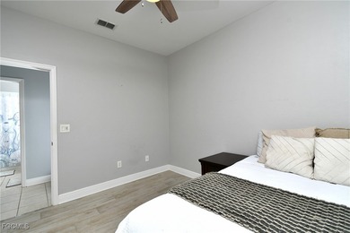 Nestled within a gated semi-private golf community, this twin on Westminster Golf Club in Florida - for sale on GolfHomes.com, golf home, golf lot