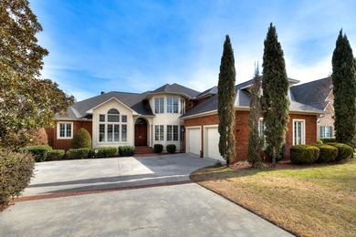 Wake up to shimmering water views in this stunning waterfront on Players Course At Wyboo Plantation in South Carolina - for sale on GolfHomes.com, golf home, golf lot