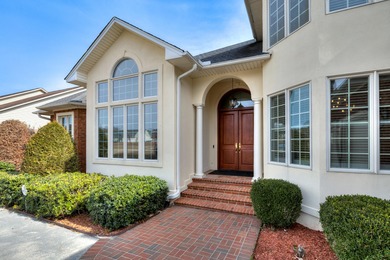 Wake up to shimmering water views in this stunning waterfront on Players Course At Wyboo Plantation in South Carolina - for sale on GolfHomes.com, golf home, golf lot