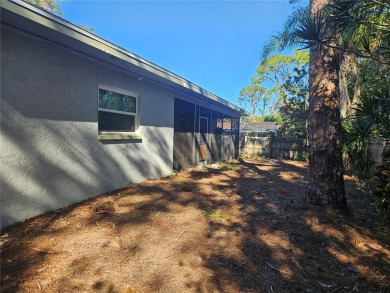 This beautifully updated 4-bedroom, 2-bathroom single-family on Largo Golf Course in Florida - for sale on GolfHomes.com, golf home, golf lot