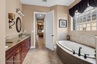 Impeccably maintained, one-owner, waterfront, POOL home in gated on Duran Golf Course in Florida - for sale on GolfHomes.com, golf home, golf lot