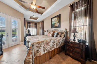 Impeccably maintained, one-owner, waterfront, POOL home in gated on Duran Golf Course in Florida - for sale on GolfHomes.com, golf home, golf lot