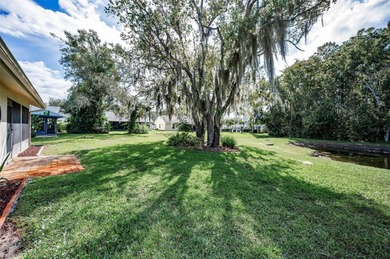 ENJOY THE POND & CONSERVATION VIEWS OF PEACE & TRANQUILITY IN on Summertree Golf Course in Florida - for sale on GolfHomes.com, golf home, golf lot