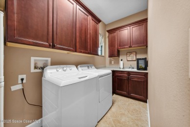 Impeccably maintained, one-owner, waterfront, POOL home in gated on Duran Golf Course in Florida - for sale on GolfHomes.com, golf home, golf lot