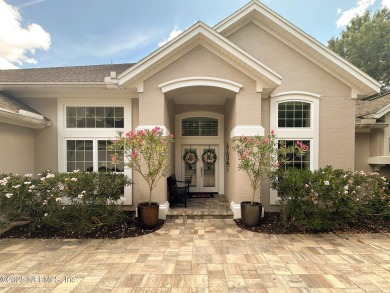 Stunning Waterfront Pool Home with Beautiful Upgrades! This on Jacksonville Golf and Country Club in Florida - for sale on GolfHomes.com, golf home, golf lot