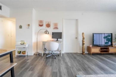 Discover the perfect blend of comfort and convenience in this on Oriole Golf and Tennis Club in Florida - for sale on GolfHomes.com, golf home, golf lot