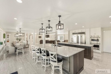 This home truly has it all and can be purchased as  a successful on Riverside Golf Course in Idaho - for sale on GolfHomes.com, golf home, golf lot