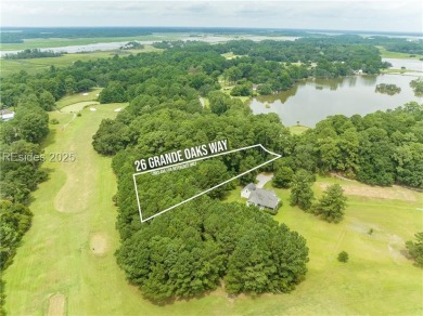 Large wooded lot located in Pleasant Point Plantation situated on The Golf Club at Pleasant Point Plantation in South Carolina - for sale on GolfHomes.com, golf home, golf lot