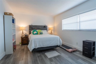 Discover the perfect blend of comfort and convenience in this on Oriole Golf and Tennis Club in Florida - for sale on GolfHomes.com, golf home, golf lot