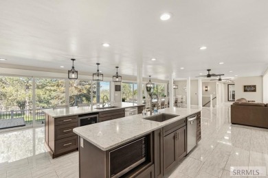This home truly has it all and can be purchased as  a successful on Riverside Golf Course in Idaho - for sale on GolfHomes.com, golf home, golf lot