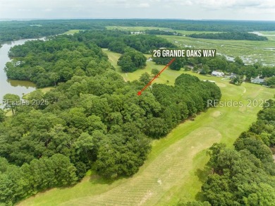 Large wooded lot located in Pleasant Point Plantation situated on The Golf Club at Pleasant Point Plantation in South Carolina - for sale on GolfHomes.com, golf home, golf lot