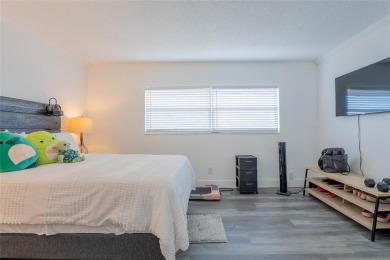 Discover the perfect blend of comfort and convenience in this on Oriole Golf and Tennis Club in Florida - for sale on GolfHomes.com, golf home, golf lot
