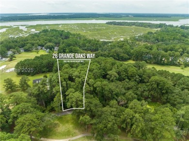 Large wooded lot located in Pleasant Point Plantation situated on The Golf Club at Pleasant Point Plantation in South Carolina - for sale on GolfHomes.com, golf home, golf lot