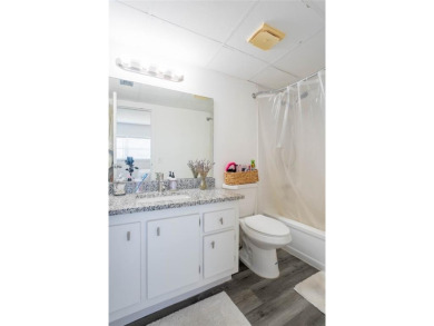 Discover the perfect blend of comfort and convenience in this on Oriole Golf and Tennis Club in Florida - for sale on GolfHomes.com, golf home, golf lot