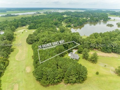 Large wooded lot located in Pleasant Point Plantation situated on The Golf Club at Pleasant Point Plantation in South Carolina - for sale on GolfHomes.com, golf home, golf lot