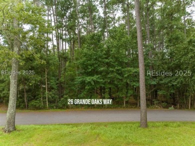 Large wooded lot located in Pleasant Point Plantation situated on The Golf Club at Pleasant Point Plantation in South Carolina - for sale on GolfHomes.com, golf home, golf lot