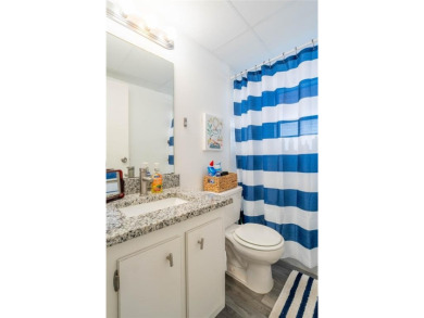 Discover the perfect blend of comfort and convenience in this on Oriole Golf and Tennis Club in Florida - for sale on GolfHomes.com, golf home, golf lot