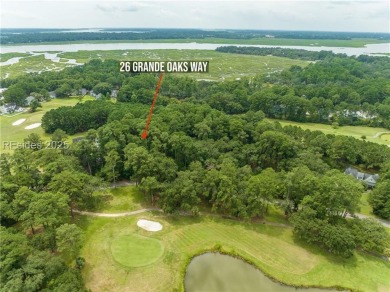 Large wooded lot located in Pleasant Point Plantation situated on The Golf Club at Pleasant Point Plantation in South Carolina - for sale on GolfHomes.com, golf home, golf lot