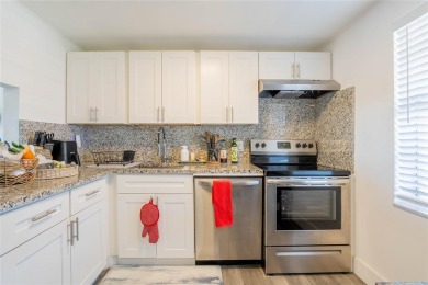 Discover the perfect blend of comfort and convenience in this on Oriole Golf and Tennis Club in Florida - for sale on GolfHomes.com, golf home, golf lot