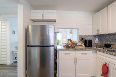 Discover the perfect blend of comfort and convenience in this on Oriole Golf and Tennis Club in Florida - for sale on GolfHomes.com, golf home, golf lot