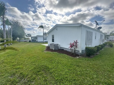 Lot Rent $1037.00  This well cared for 2 bedrooms, 2 bathrooms on Del Tura Golf and Country Club in Florida - for sale on GolfHomes.com, golf home, golf lot