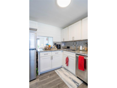 Discover the perfect blend of comfort and convenience in this on Oriole Golf and Tennis Club in Florida - for sale on GolfHomes.com, golf home, golf lot