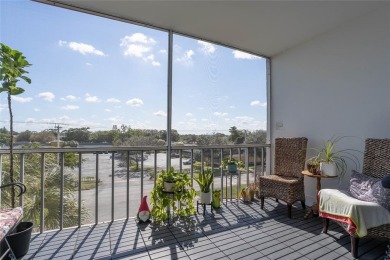 Discover the perfect blend of comfort and convenience in this on Oriole Golf and Tennis Club in Florida - for sale on GolfHomes.com, golf home, golf lot