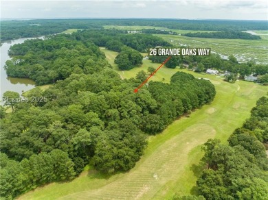 Large wooded lot located in Pleasant Point Plantation situated on The Golf Club at Pleasant Point Plantation in South Carolina - for sale on GolfHomes.com, golf home, golf lot