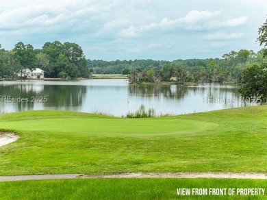 Large wooded lot located in Pleasant Point Plantation situated on The Golf Club at Pleasant Point Plantation in South Carolina - for sale on GolfHomes.com, golf home, golf lot