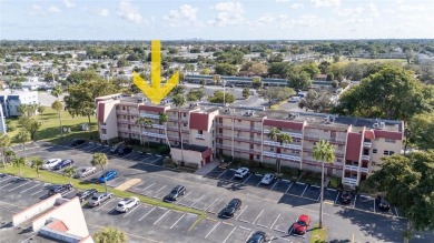 Discover the perfect blend of comfort and convenience in this on Oriole Golf and Tennis Club in Florida - for sale on GolfHomes.com, golf home, golf lot