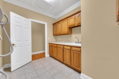 This 2,500 sq ft all-brick home offers comfortable one-level on Link Hills Country Club in Tennessee - for sale on GolfHomes.com, golf home, golf lot