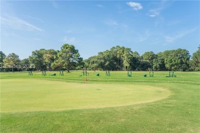 Large wooded lot located in Pleasant Point Plantation situated on The Golf Club at Pleasant Point Plantation in South Carolina - for sale on GolfHomes.com, golf home, golf lot