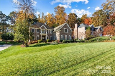 Nestled on the Cowans Ford Golf Course, this home perfectly on Cowans Ford Country Club in North Carolina - for sale on GolfHomes.com, golf home, golf lot